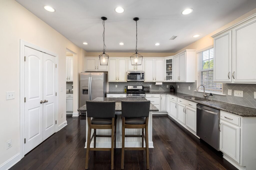 Modern kitchen with recessed and under cabinet lighting