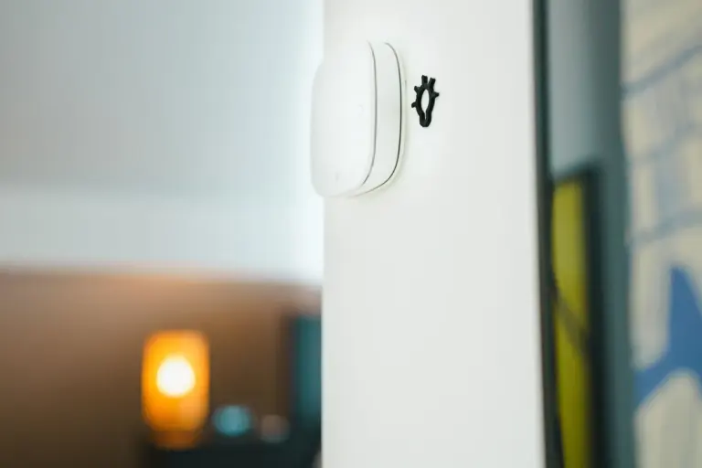 Smart light switch installed on a wall in a modern home